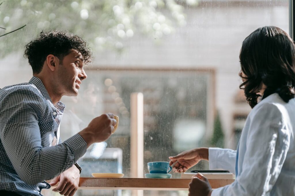 people-sitting-in-cafe-drinking-coffee