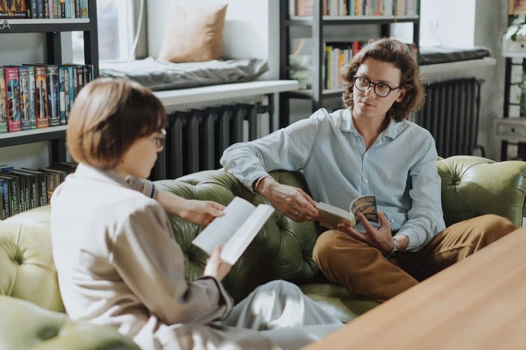 woman-in-gray-robe-reading-book