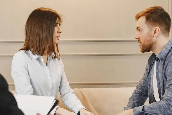 couple talking in therapy session