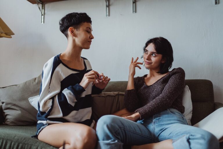 two people sitting-on-couch