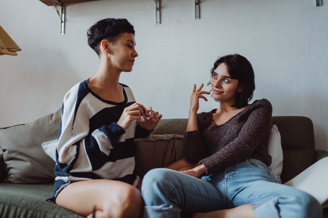 two people sitting-on-couch