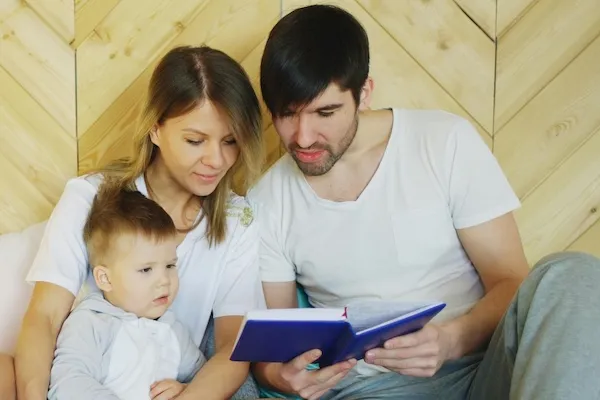 parents reading to child