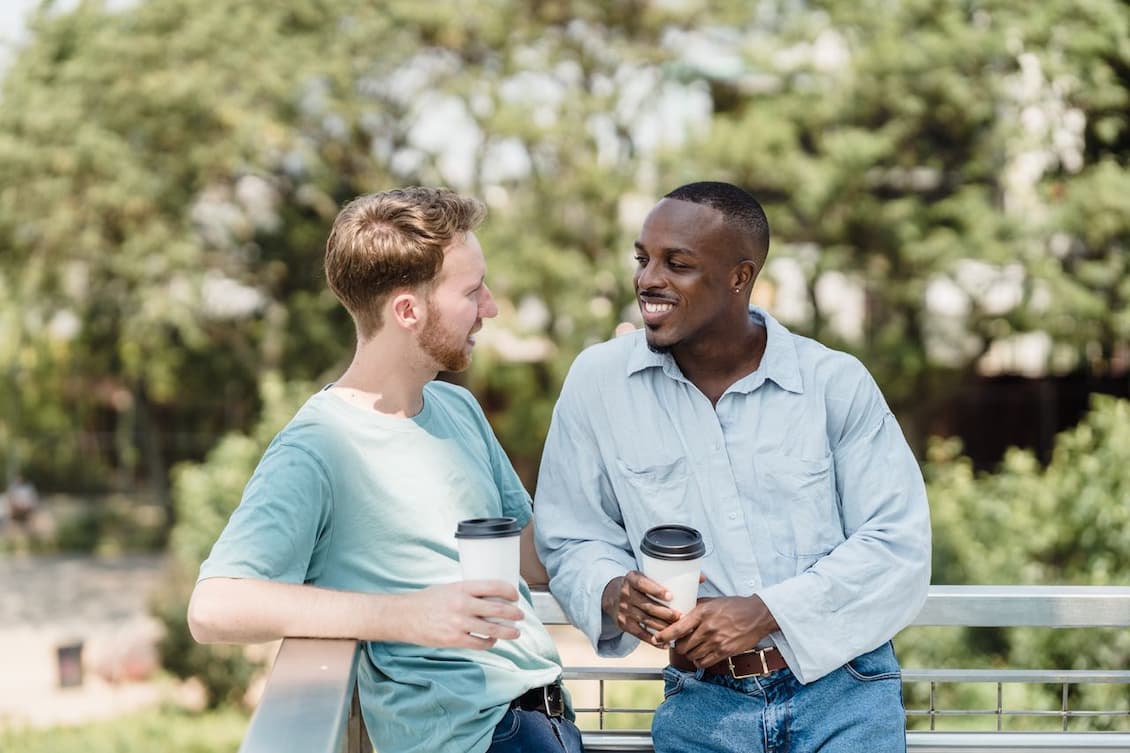 couple-talking-on-city-street