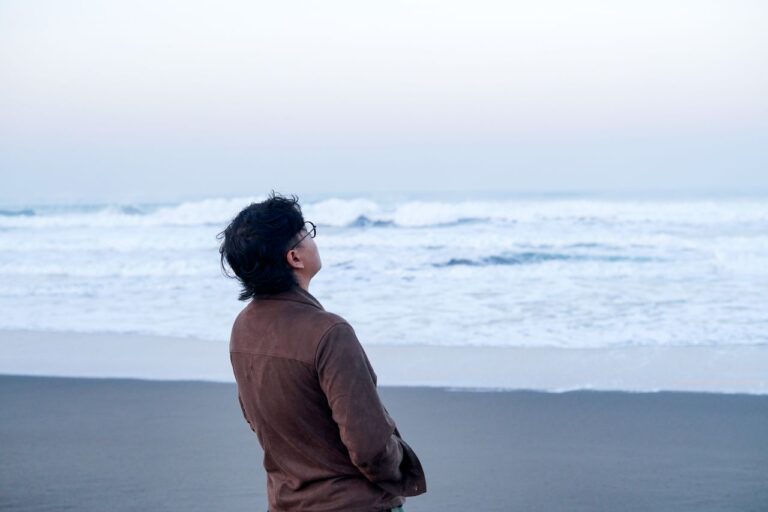 contemplative-moment-by-the-sea-at-sunrise