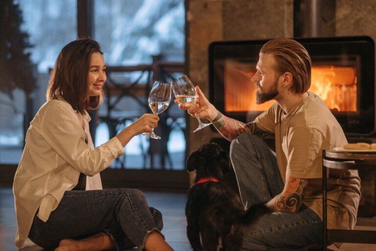 woman-in-white-long-sleeve-shirt-holding-clear-wine-glass